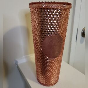 This is a Starbucks Rose Gold Studded Tumbler Venti